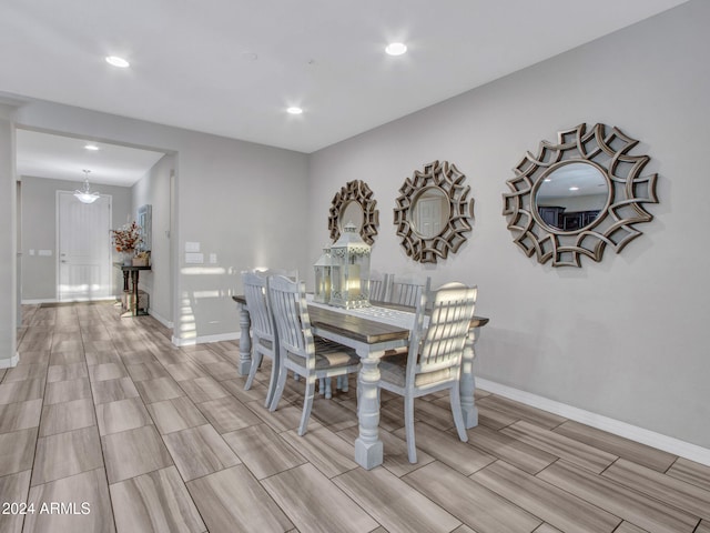 dining room featuring a notable chandelier