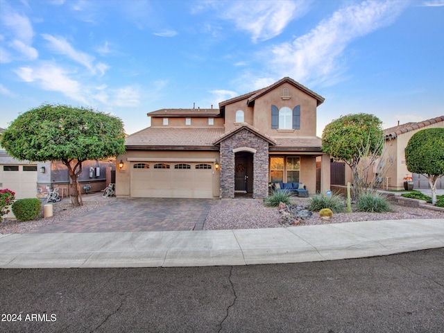 view of front of house with a garage