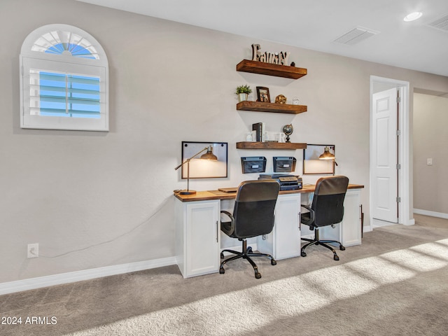 office space featuring light carpet