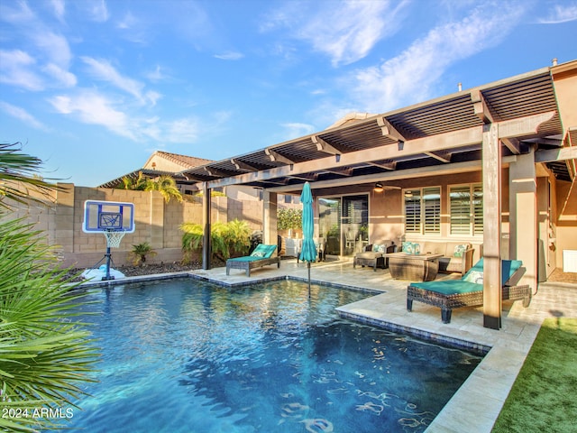 view of swimming pool featuring a pergola, a patio area, and an outdoor hangout area