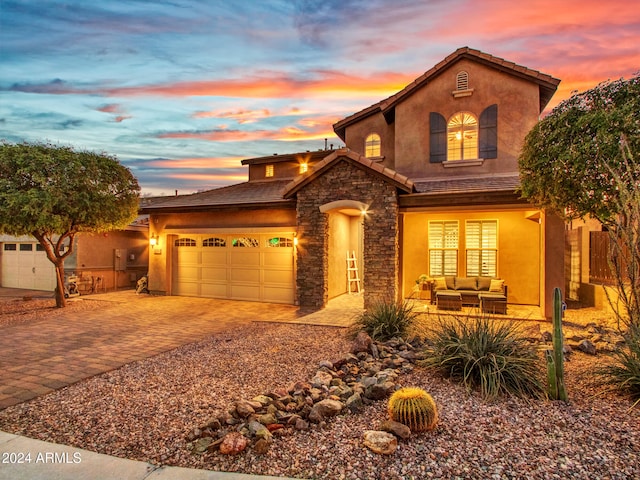 view of front of home with a garage