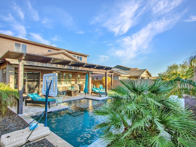 view of swimming pool featuring a pergola, a patio area, and an outdoor hangout area