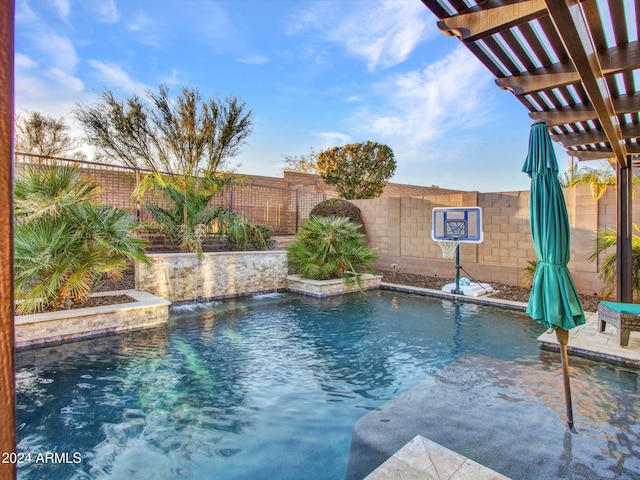 view of pool featuring a pergola and pool water feature