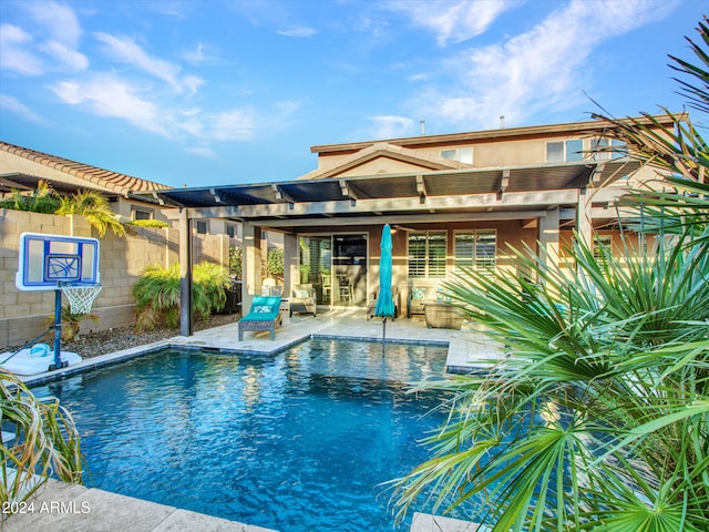 view of pool featuring a pergola and a patio