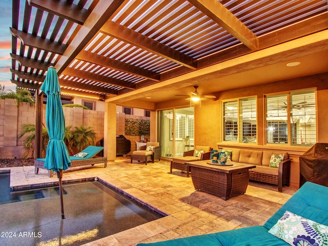 patio terrace at dusk featuring outdoor lounge area, ceiling fan, and a pergola