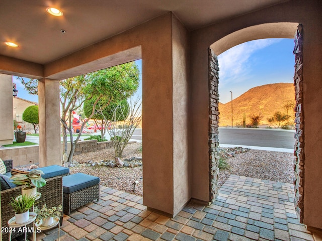 view of patio with a mountain view