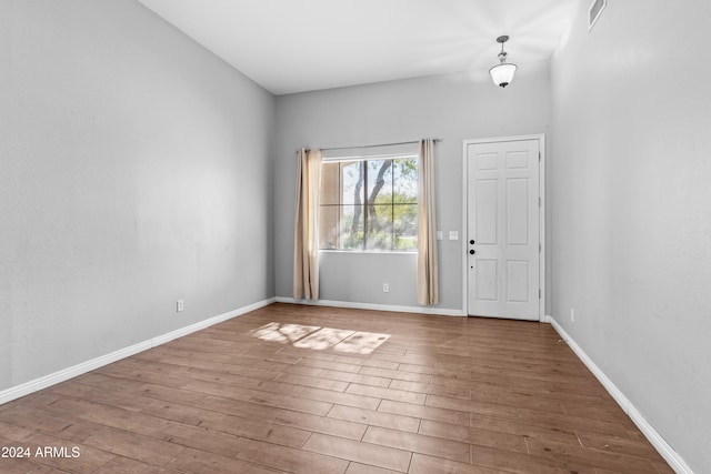 foyer entrance featuring hardwood / wood-style floors