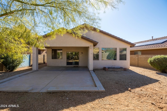 back of house featuring a patio area