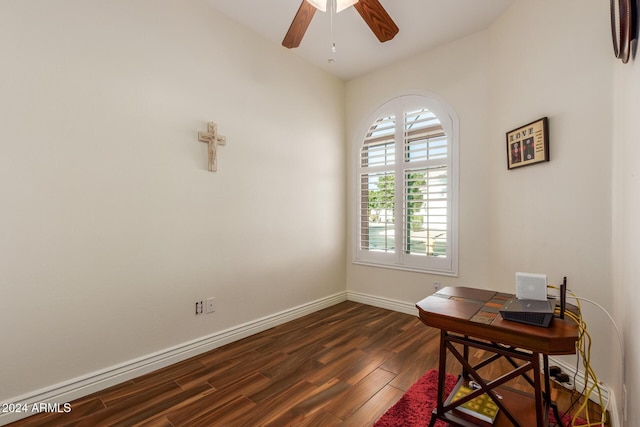 home office featuring dark hardwood / wood-style floors and ceiling fan