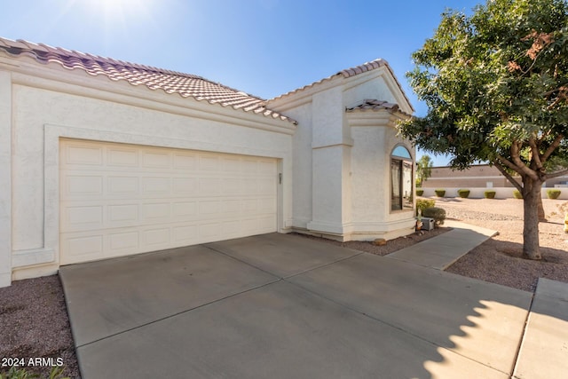 exterior space featuring a garage