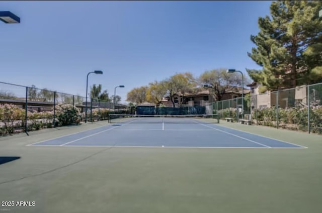 9451 E Becker Ln Unit 1051, Scottsdale, AZ 85260 - view of tennis court featuring community basketball court