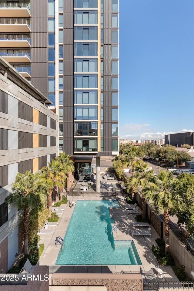 view of pool featuring a patio area