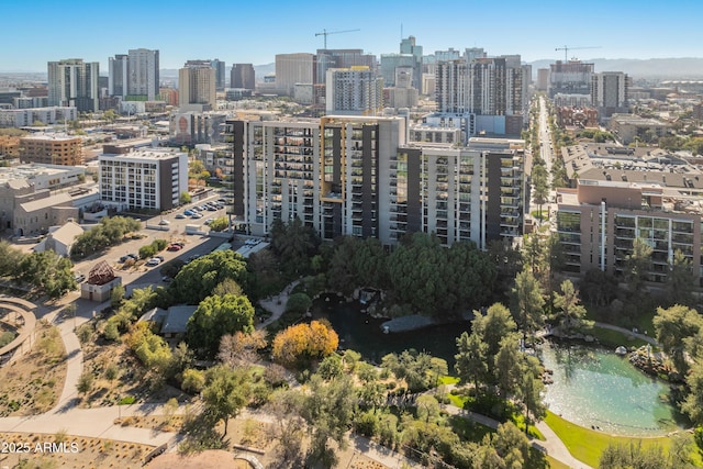 drone / aerial view with a water view