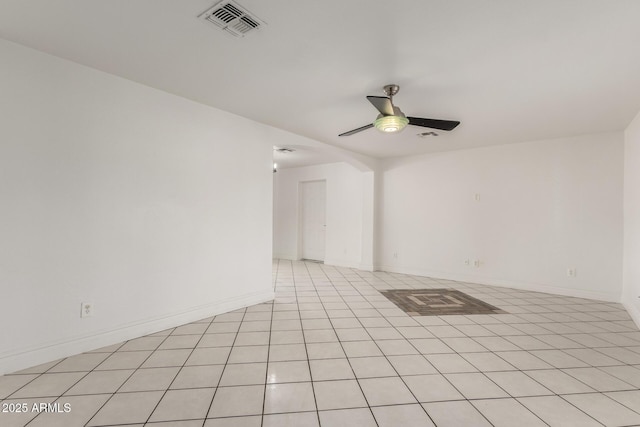 unfurnished room featuring ceiling fan and light tile patterned floors