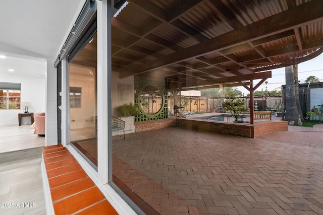 view of patio with a fenced in pool