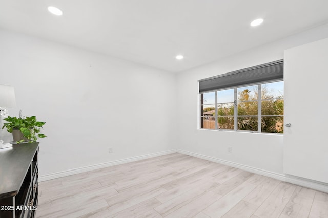 empty room featuring light hardwood / wood-style floors