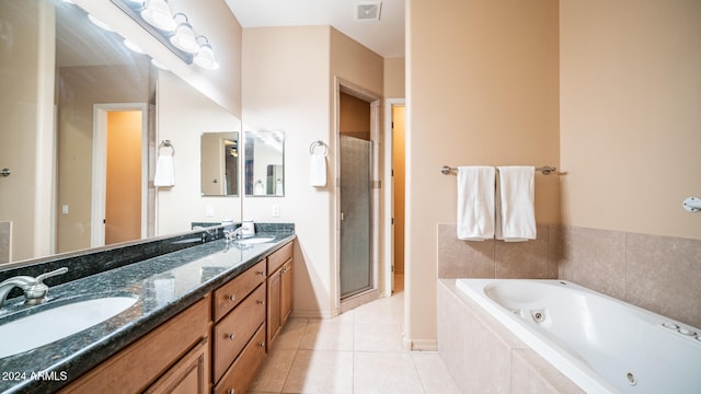 bathroom featuring vanity, tile patterned floors, and independent shower and bath