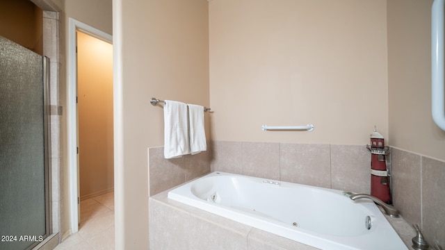 bathroom featuring shower with separate bathtub and tile patterned floors