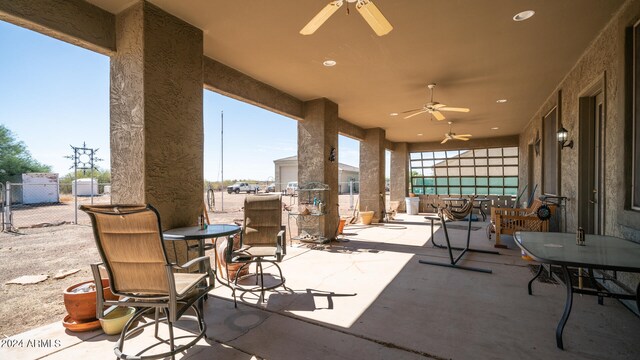 view of patio with ceiling fan