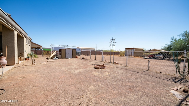 view of yard with a storage shed