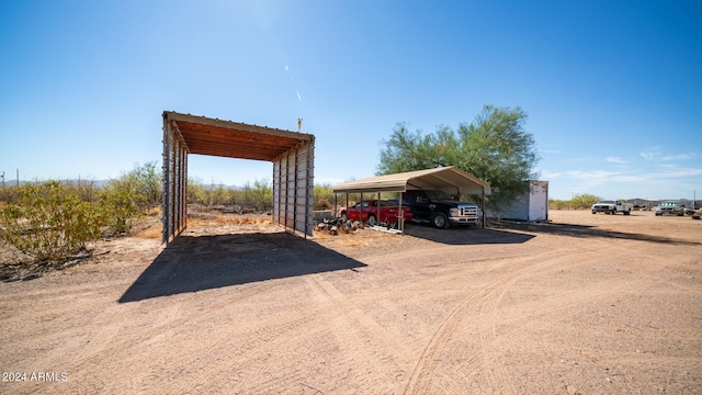 view of parking featuring a carport