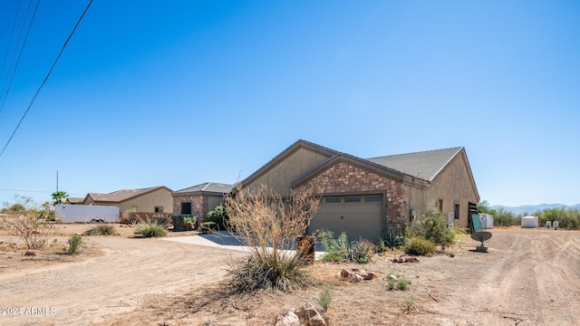 view of front of home featuring a garage