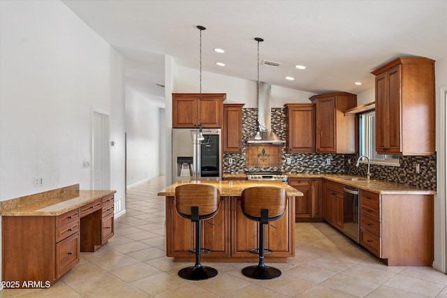 16804 E Monterey Dr, Fountain Hills, AZ 85268 - kitchen with wall chimney range hood, appliances with stainless steel finishes, a sink, backsplash, and vaulted ceiling