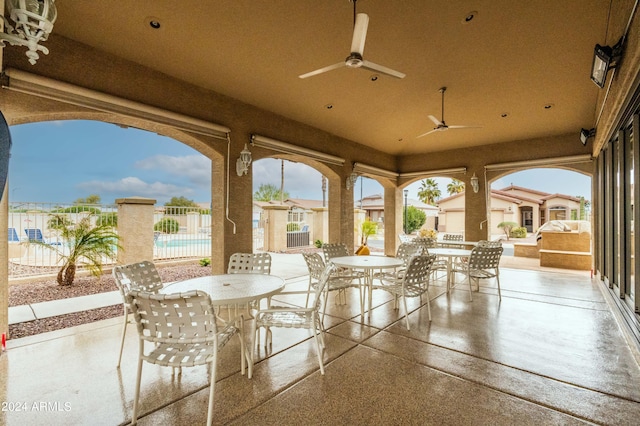 view of patio / terrace featuring ceiling fan