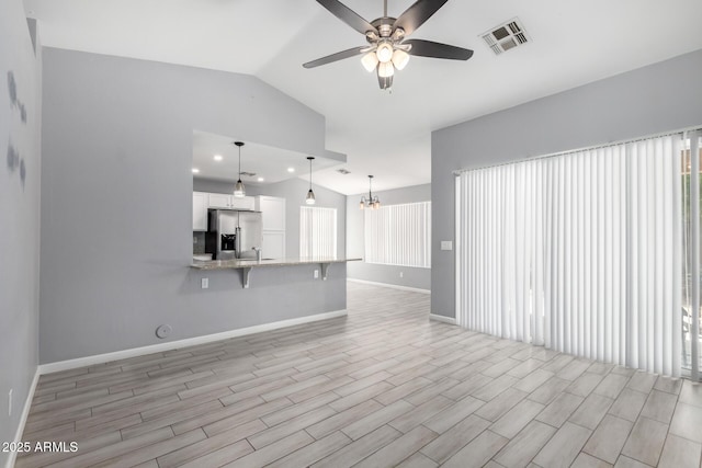 8341 W Cypress St, Phoenix, AZ 85037 - unfurnished living room with a ceiling fan, lofted ceiling, light wood-style floors, and recessed lighting