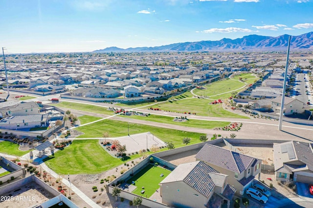 birds eye view of property featuring a mountain view