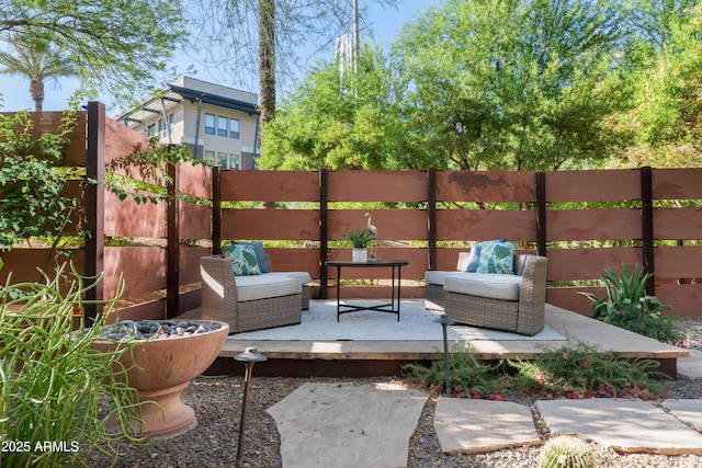 7117 E Rancho Vista Dr Unit 1012, Scottsdale, AZ 85251 - view of patio with a wooden deck and outdoor lounge area