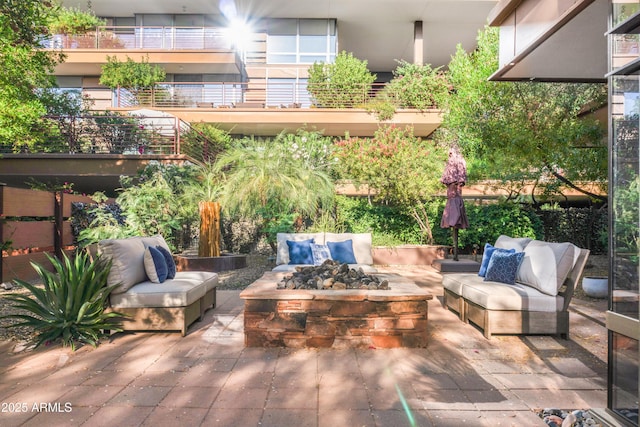 7117 E Rancho Vista Dr Unit 1012, Scottsdale, AZ 85251 - view of patio / terrace featuring an outdoor living space with a fire pit