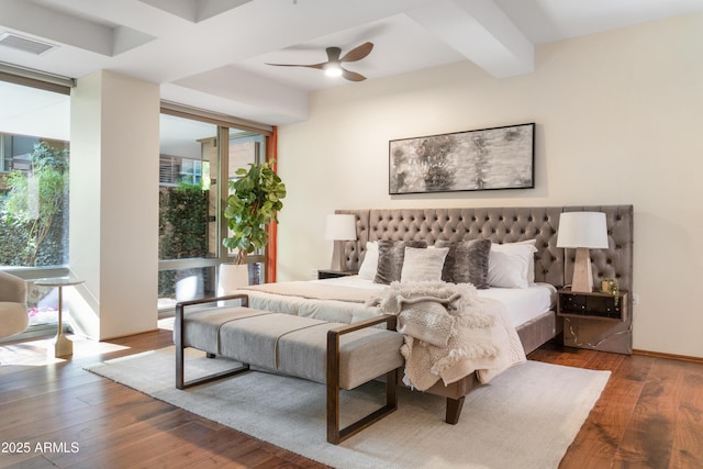 7117 E Rancho Vista Dr Unit 1012, Scottsdale, AZ 85251 - bedroom featuring wood finished floors and a ceiling fan