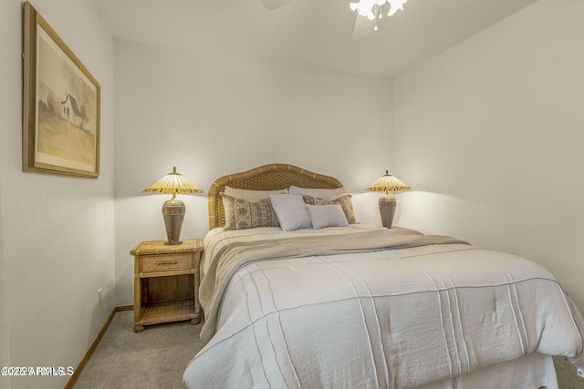 bedroom with carpet flooring, baseboards, and ceiling fan