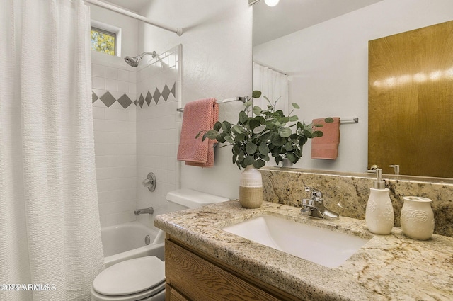 full bath with shower / bathtub combination with curtain, toilet, and vanity