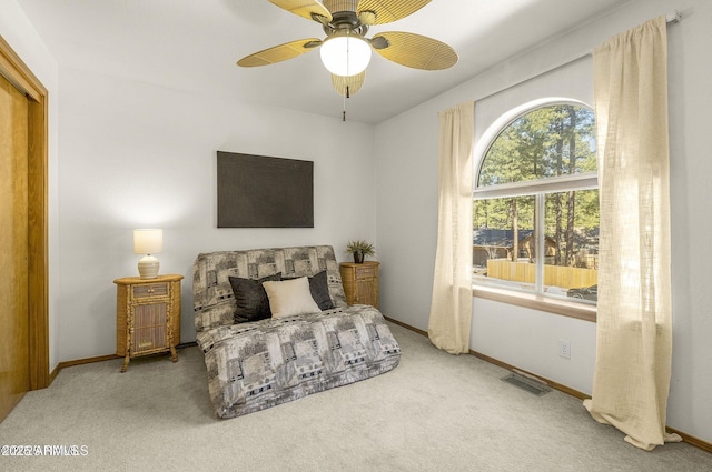 bedroom featuring baseboards, visible vents, and carpet