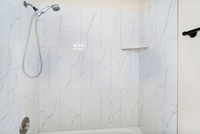 bathroom with shower / washtub combination