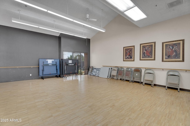 misc room featuring high vaulted ceiling and ceiling fan
