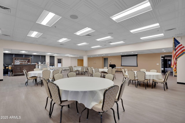 dining space with light wood-type flooring