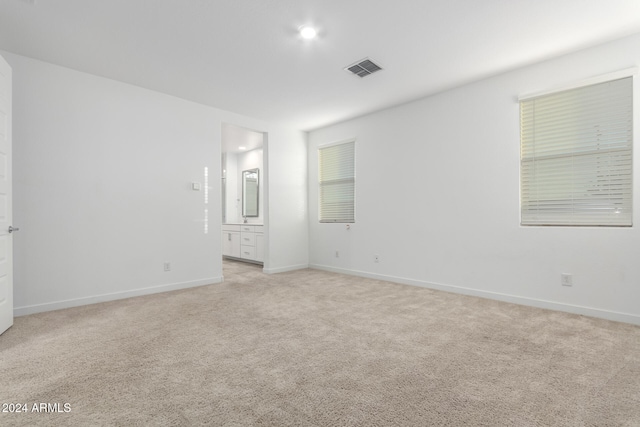 empty room with light carpet