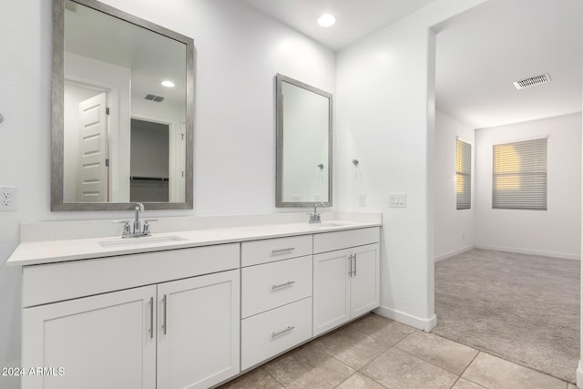 bathroom with vanity and tile patterned flooring