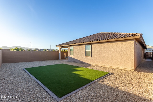 back of property with a patio area