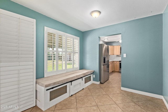 2161 E Harmony Cir, Mesa, AZ 85204 - mudroom with baseboards and light tile patterned flooring
