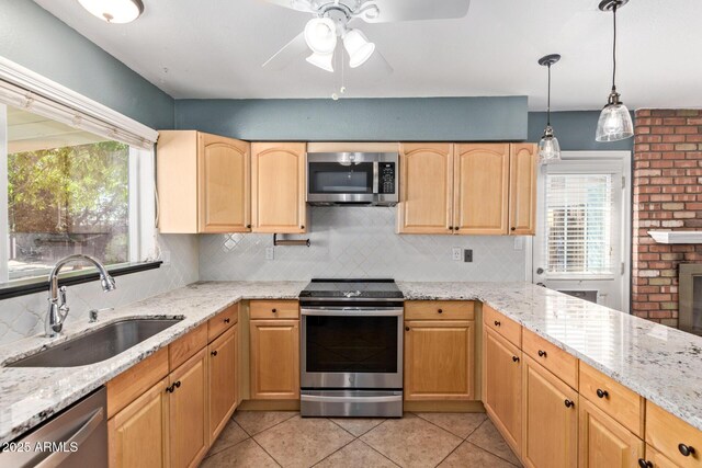 2161 E Harmony Cir, Mesa, AZ 85204 - kitchen with appliances with stainless steel finishes, ceiling fan, backsplash, and light tile patterned flooring