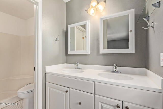 2161 E Harmony Cir, Mesa, AZ 85204 - bathroom featuring double vanity, tile patterned floors, and a textured wall