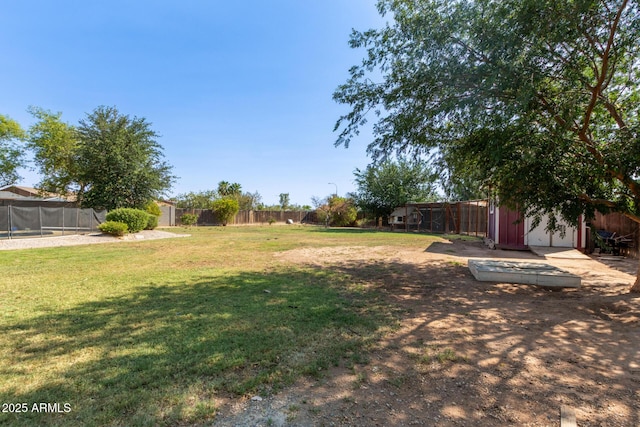 2161 E Harmony Cir, Mesa, AZ 85204 - view of yard featuring a trampoline and an outdoor structure