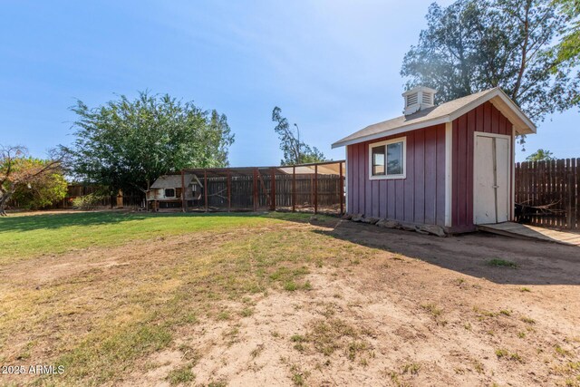 2161 E Harmony Cir, Mesa, AZ 85204 - fenced backyard featuring an outbuilding