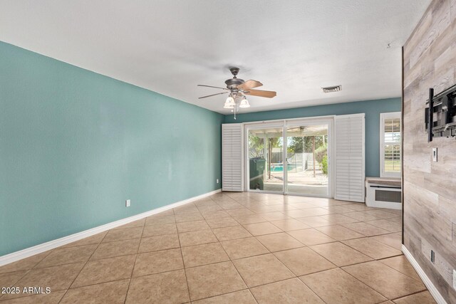 2161 E Harmony Cir, Mesa, AZ 85204 - spare room featuring ceiling fan and light tile patterned flooring