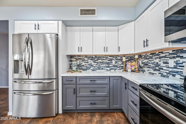 1638 N Avoca, Mesa, AZ 85207 - kitchen with stainless steel appliances, gray cabinets, and tasteful backsplash