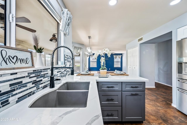 1638 N Avoca, Mesa, AZ 85207 - kitchen with a sink, recessed lighting, light stone countertops, gray cabinets, and a peninsula